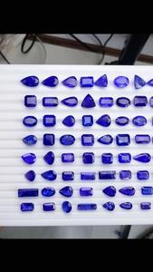 แทนซาไนต์ดิบธรรมชาติ รับรองโดย IGI ไม่ผ่านการบำบัด รูปทรงคละกัน 708 กะรัต สีสันสวยงาม ระยิบระยับ คุณภาพพรีเมียม พลอยสีม่วงน้ำเงิน - Product Image 6