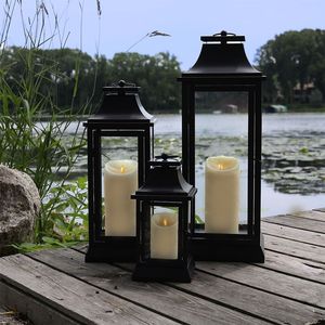 Elegant metal <b>candle</b> lantern with clear glass panels ideal for romantic lighting <b>dinner</b> decor and special occasions - Product Image 1