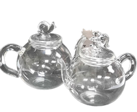 Vente en gros de théières minimalistes écologiques résistantes à la chaleur, théières en verre borosilicate soufflées à la main, mini théières de 90-100 ml pour hôtel