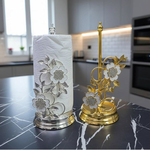 Un juego de servilleteros con un diseño único de hojas y ramas doradas sobre una base de mármol blanco de primera calidad. Disponible a precios de mayorista. - Product Image 4