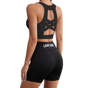 สปอร์ตบราผ่าหลังแบบไขว้โลโก้ด้านหน้าแบบสั่งทำสีแห้งเร็วและระบายอากาศได้ดีสำหรับโยคะและยิม - Product Image 1