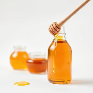 น้ำผึ้งธรรมชาติคุณภาพดีที่สุด น้ำผึ้งดิบ อุดมด้วยสารอาหารเพื่อสุขภาพ เหมาะสำหรับอาหารและโภชนาการ มีจำหน่ายแล้ว - Product Image 1