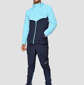 ชุดเซ็ตวอร์มกีฬาผู้ชาย 2 ชิ้น ผ้าโพลีเอสเตอร์แห้งเร็วแบบกำหนดเอง ผสมไนลอนสีตัดต่อ สำหรับออกกำลังกายกลางแจ้งและฝึกซ้อม - Product Image 1