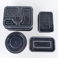 Vente en gros de bols ronds jetables en plastique noir micro-ondables avec couvercles épais et portables pour le stockage de salade de snack de restauration rapide