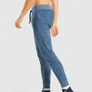 กางเกงวิ่งออกกำลังกายผู้ชาย ทรงปกติ น้ำหนักเบา คุณภาพสูง ผลิตจากผ้าโพลีเอสเตอร์/คอตตอนผสม แห้งเร็ว มีกระเป๋าข้าง - Product Image 5