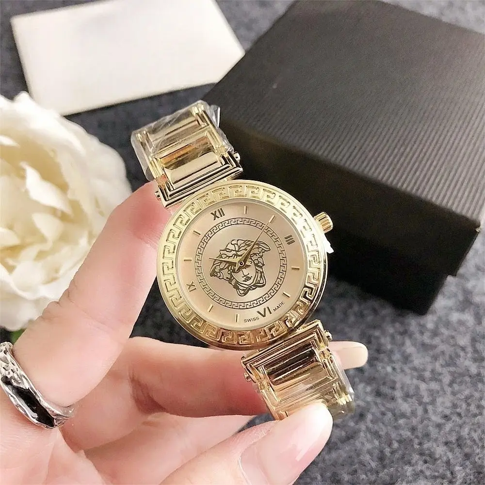 Montre tendance pour femme avec mon logo montres de luxe en métal avec dos en acier inoxydable avec assurance commerce montres logo personnalisé pour poignet d'homme