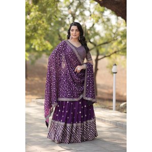 LEHENGA CHOLI DE OBRA BORDADA PESADA DE KARNAVII DE - Product Image 1