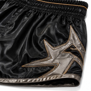 Shorts de boxe unisexe noirs avec imprimé étoile dorée, respirants, durables, légers, séchage rapide, en polyester, pour arts martiaux, sans coutures - Product Image 4