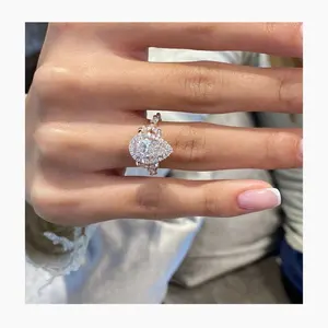 แหวนหมั้นเพชรโมอิสซาไนต์ทรงลูกแพร์วินเทจ ประดับด้วยเฮโล่  ทำจากเงินแท้ 925 ชุบทองคำสีกุหลาบ แหวนเจ้าสาวสุดหรู TISHYA DIAMOND - Product Image 1