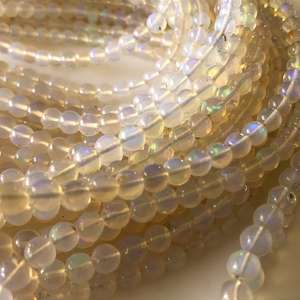 ลูกปัดโอปอลเอธิโอเปียธรรมชาติทรงกลมเรียบเนียน ประกายไฟ สำหรับทำเครื่องประดับ ร้อยเป็นเส้น หรือแบบเม็ดเดี่ยว - Product Image 6