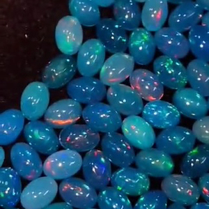 794 pièces d'opale bleue naturelle éthiopienne, cabochons ovales 6x4mm, lot de 254 carats, Iroc Sales, pierres précieuses en vrac pour la création de bijoux - Product Image 4
