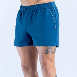 Pantalones cortos deportivos azules de nuevo diseño para hombre, con logotipo personalizado en los bolsillos elásticos con ribete, pantalones cortos de verano estilo streetwear para hombre - Product Image 1
