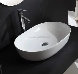 A buon mercato moderno sanitari porcellana porcellana lavabo ovale da banco in ceramica lavabo Hotel bagno lavandino