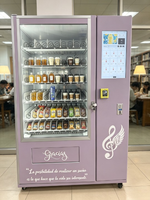 Distributeur automatique de boissons et de collations pour les cinémas avec panneaux latéraux insonorisés