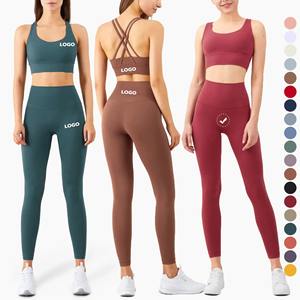 ชุดออกกำลังกายผู้หญิงแขนยาวแบบครอปท็อปเปิดไหล่ข้างเดียว ชุดโยคะ 2 ชิ้น สไตล์เลกกิ้งและบรา - Product Image 1