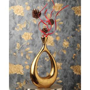 Elegante florero de metal con cuerpo pulido y apertura estrecha, perfecto para decoración contemporánea y un estilo interior elegante. - Product Image 4