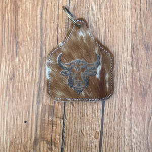 Llavero de cuero de vaca genuino con relieve láser personalizado llavero occidental con materiales de aleación de metal de cuero - Product Image 3