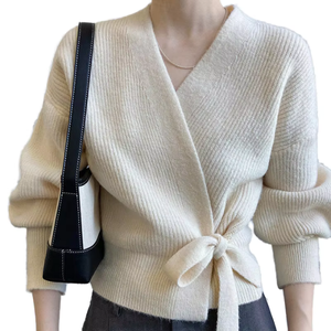 Cárdigan de punto color crema con cuello en V para mujer, con manga farol y lazo frontal, diseño minimalista y liso, para otoño. - Product Image 1