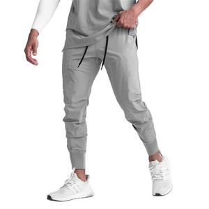 Pantalons de sport décontractés pour hommes Pantalons de jogging en nylon et polyester Pantalons de jogging en tissu respirant - Product Image 1