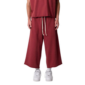 Shorts amples en molleton noir pour homme, coupe 3/4, taille élastique, imprimé graphique latéral, style streetwear décontracté, vente en gros OEM - Product Image 1