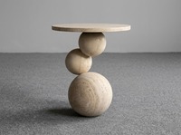 Table basse moderne en pierre avec base sphérique, mobilier de salon minimaliste, design artisanal