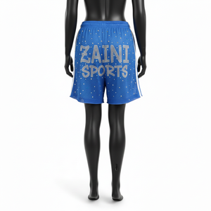 Shorts deportivos transpirables de poliéster para mujer, color azul con paneles laterales blancos, logotipo con pedrería brillante y transferencia térmica. - Product Image 2