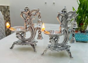 Modern Industrial German <b>Silver</b> Peacock Diya Pair with Hanging Bells Elegant Decorative Oil <b>Lamps</b> for Pooja Home Decor - Product Image 4
