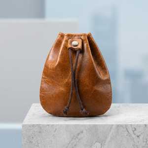 กระเป๋าใส่เหรียญหนังทำมือทรงวงรีแบบเรียบง่ายพกพาสะดวก - Product Image 1