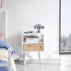 Luxury style white wood and rattan bedside table with rattan drawer and open shelf nightstand for boho modern bedroom decor - Product Image 1