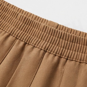 Jupe courte plissée pour femme, couleur unie, taille élastique, 100% polyester, confortable, style toutes saisons - Product Image 4