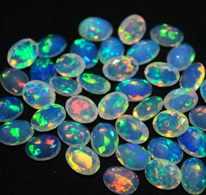 Genuine Natural Oval Cut Ethiopian Opal Gemstone Multi <b>Fire</b> Effect Calibrated Loose <b>Stone</b> Wholesale Price - Product Image 1