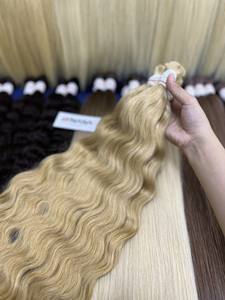 Vente en gros d'extensions de cheveux humains vierges bouclés naturels vietnamiens de 30 pouces 100g en vrac cheveux décolorés de couleur claire - Product Image 5