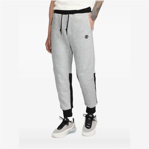 Pantalones deportivos con paneles de tejido Tech Fleece - Product Image 1