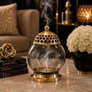 Brûle-encens design avec couvercle en marbre noir naturel et base en métal cannelé, créant une décoration luxueuse et spectaculaire. - Product Image 4