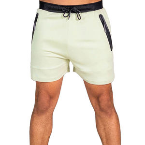 Shorts en tricot blanc uni pour hommes avec poches, cordon de serrage à la taille, séchage rapide, vêtements décontractés - Product Image 1