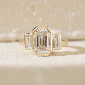 3ct Emerald Cut Lab Grown Diamond Three <b>Stone</b> Ring 14K Yellow Gold IGI Certified Bezel Set Engagement Ring with Baguette diamond - Product Image 1