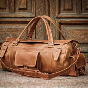 Sac de voyage week-end vintage en cuir véritable robuste pour hommes et femmes, grande capacité, portable, léger, avec pieds métalliques - Product Image 1