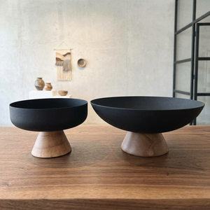 Minimalist Matte Black Metal Serving Bowl Set Elevated On Smooth Pedestal Wooden Bases Ideal For Contemporary Tabletop Displays - Product Image 1