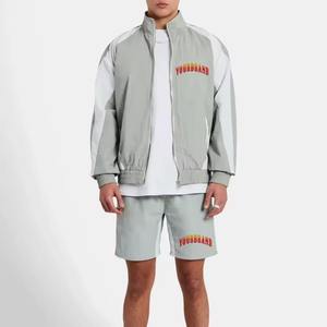 Ensemble de survêtement en nylon de haute qualité avec veste coupe-vent zippée à capuche et short, motif patchwork colorblock personnalisé - Product Image 2