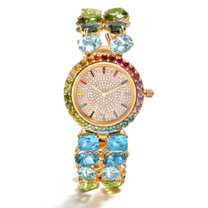 Montre ronde de luxe pour femme avec cadran en strass et bracelet en pierres précieuses en or jaune - Product Image 1