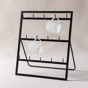 Porte-gobelet élégant en fer noir avec cadre incurvé minimaliste et base robuste pour un rangement fonctionnel et élégant - Product Image 1