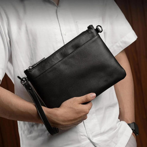 Bolso de mano de cuero genuino con organizador de pulsera, diseñado para un transporte seguro en el día a día y comodidad en viajes, a un precio razonable. - Product Image 2