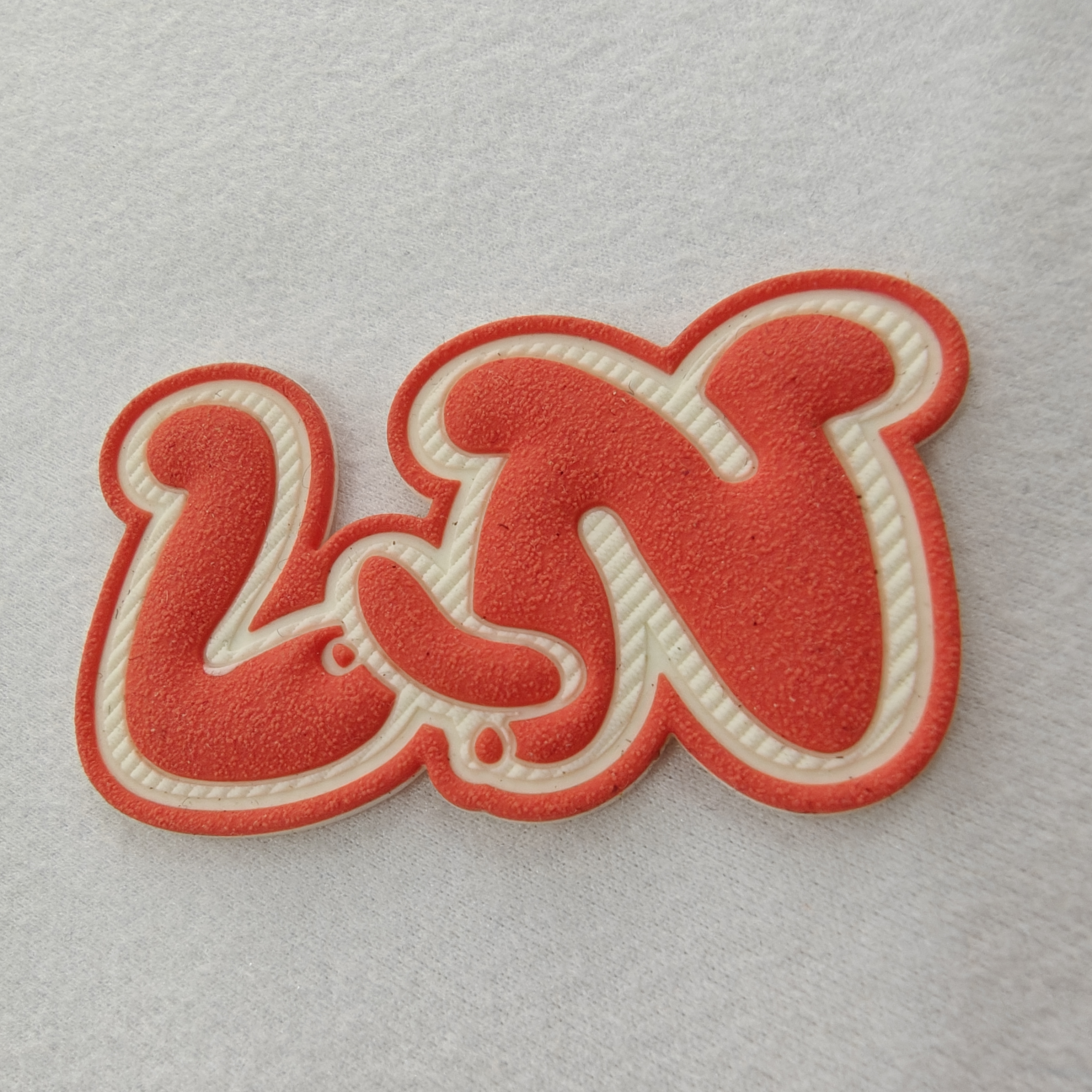 Étiquette en silicone personnalisée avec gaufrage 3D