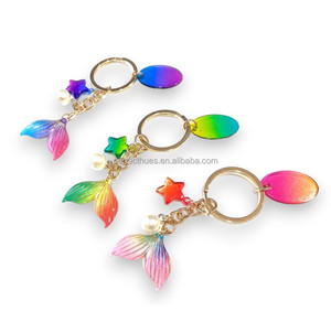Llavero de Cola de Sirena Colorido con Colgante de Estrella y Dije de Perla, Llavero de Resina con Mosquetón para Niñas - Product Image 1