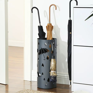 Decorative Cylindrical Metal Umbrella Stand With Artistic Design For Living Room And Lobby Decoration - Product Image 1