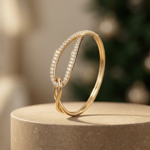 Luxury Diamond Interlocking Twist <b>Bangle</b> in 10k 14k 18k Yellow Gold Sparkling Micro Pave statement <b>Bracelet</b> - Product Image 1