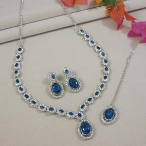 Silver Plated Crystal Diamond Necklace Earrings & Maang <b>Tikka</b> <b>Jewellery</b> Set for Women IJ400ZMO - Product Image 1