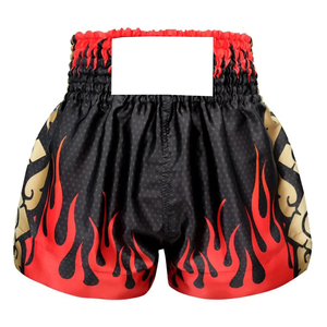Custom Fire Graphic Muay Thai Shorts - Durable <b>Black</b> Satin <b>Trunks</b> with Gold Side Panels - Professional Martial Arts Fight Wear - Product Image 1