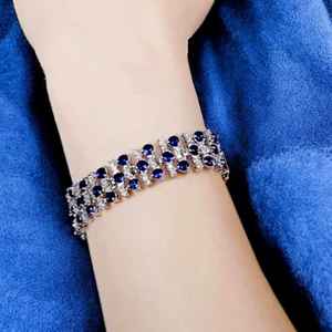 Bracelet tennis vintage en saphir bleu plaqué or, conçu pour une élégance royale, éclat bleu profond, bijoux de luxe intemporels - Product Image 2