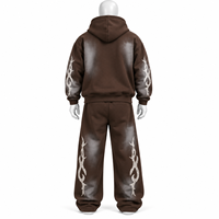 Ensemble de survêtement streetwear avec broderie de logo personnalisé, comprenant un sweat à capuche imprimé effet délavé et un pantalon évasé, fermeture éclair, en vente